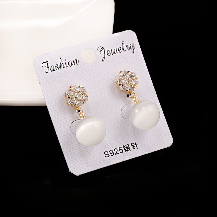 Round pearl long earrings - URBAN METRO