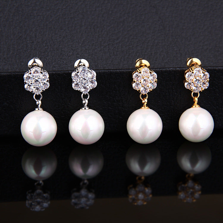 Round pearl long earrings - URBAN METRO