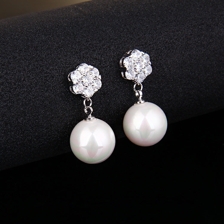 Round pearl long earrings - URBAN METRO