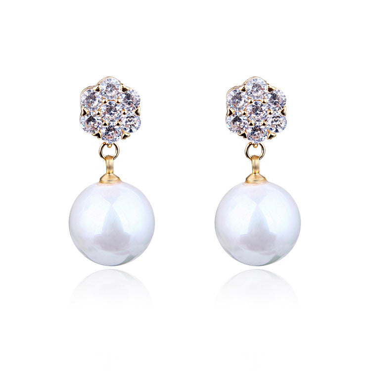 Round pearl long earrings - URBAN METRO