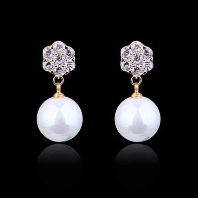 Round pearl long earrings - URBAN METRO