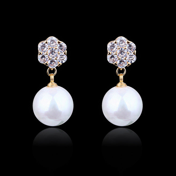 Round pearl long earrings - URBAN METRO