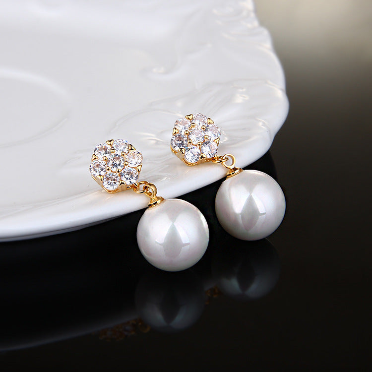 Round pearl long earrings - URBAN METRO