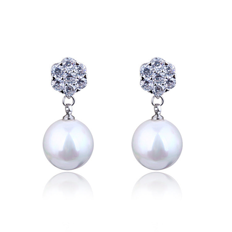 Round pearl long earrings - URBAN METRO
