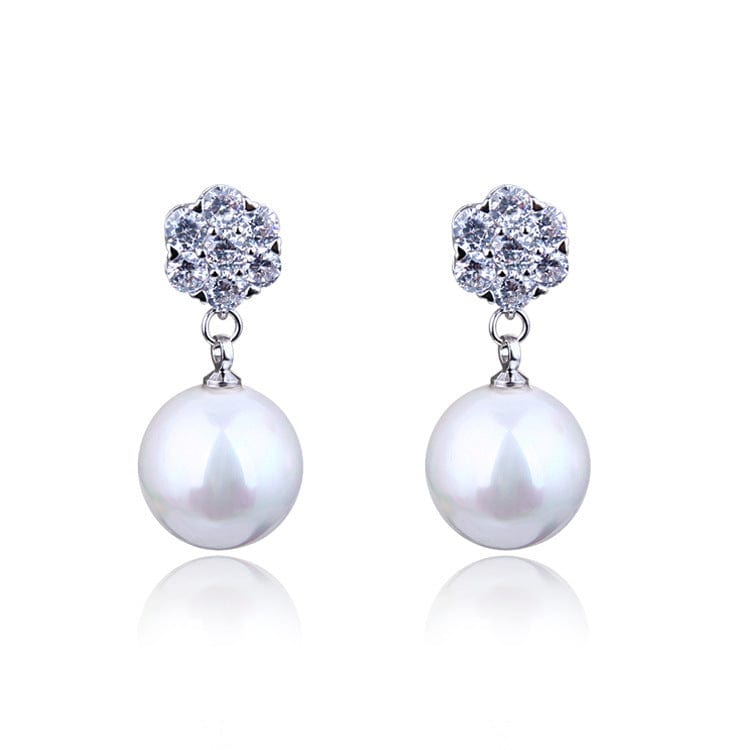 Round pearl long earrings - URBAN METRO
