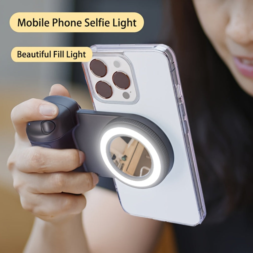Hand holding a phone with a selfie light attachment, showcasing 'Beautiful Fill Light' feature.