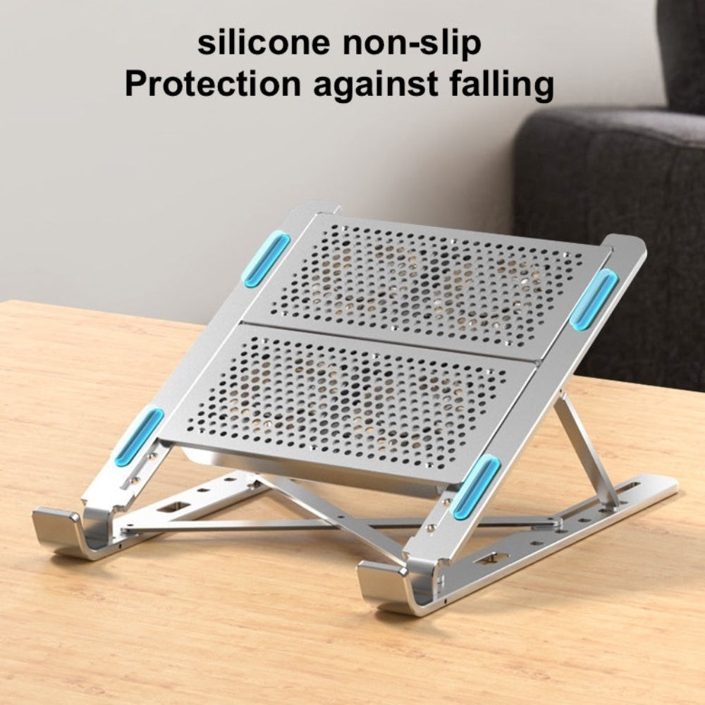 Metallic laptop stand with silicone non-slip features on a wooden surface.
