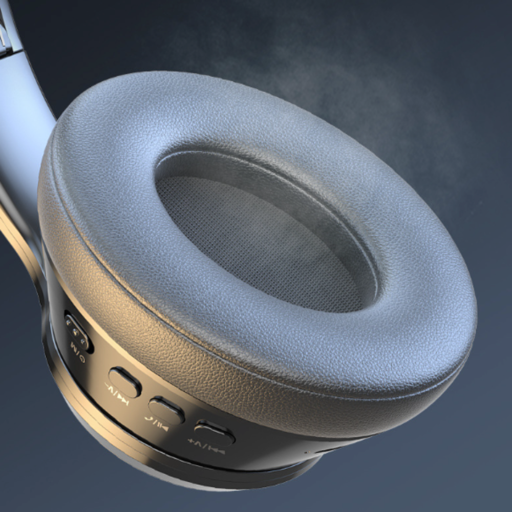 Close-up of a headphone ear pad with control buttons on a dark background