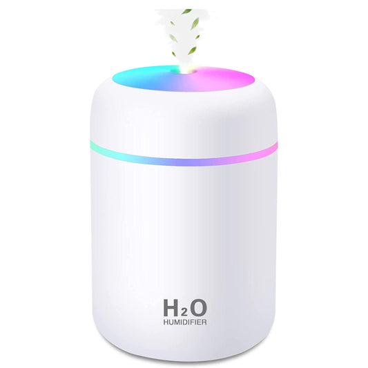White humidifier with colorful LED lights on a white background