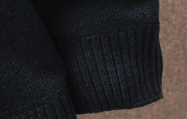 Mens winter hooded knit jacket with zip-up closure and patterned design