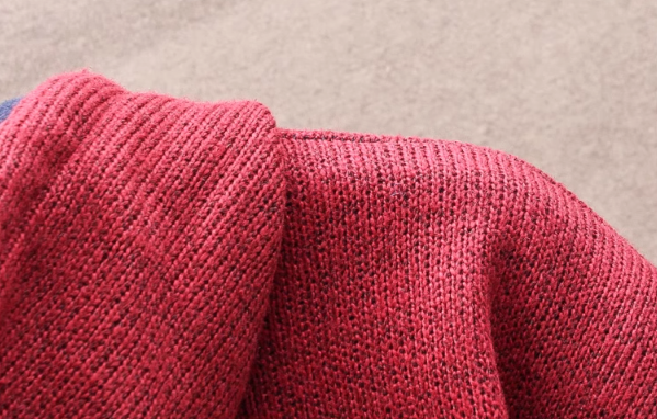 Mens winter hooded knit jacket with zip-up closure and patterned design